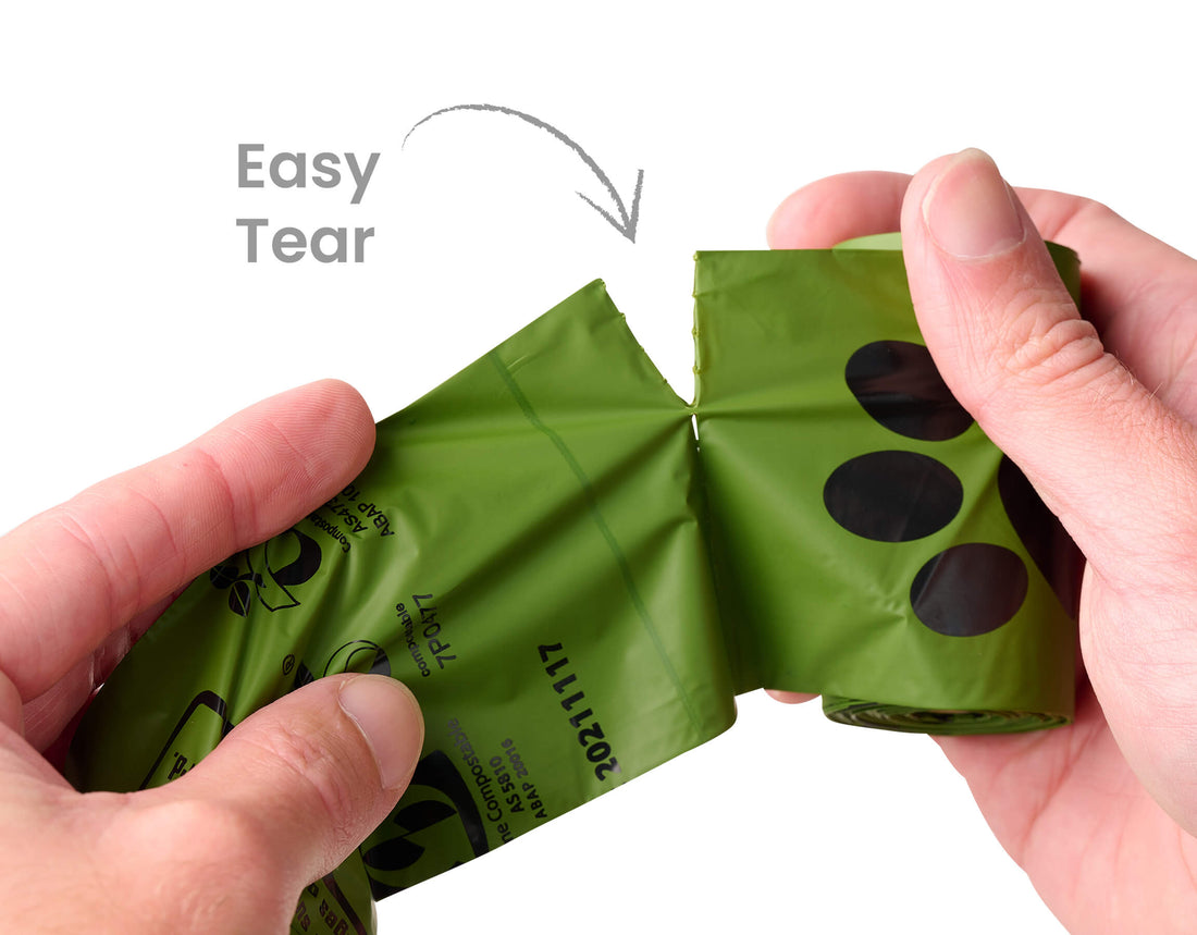 An image showing Oh Crap compostable dog poop bags being pulled apart with the text easy year next to it